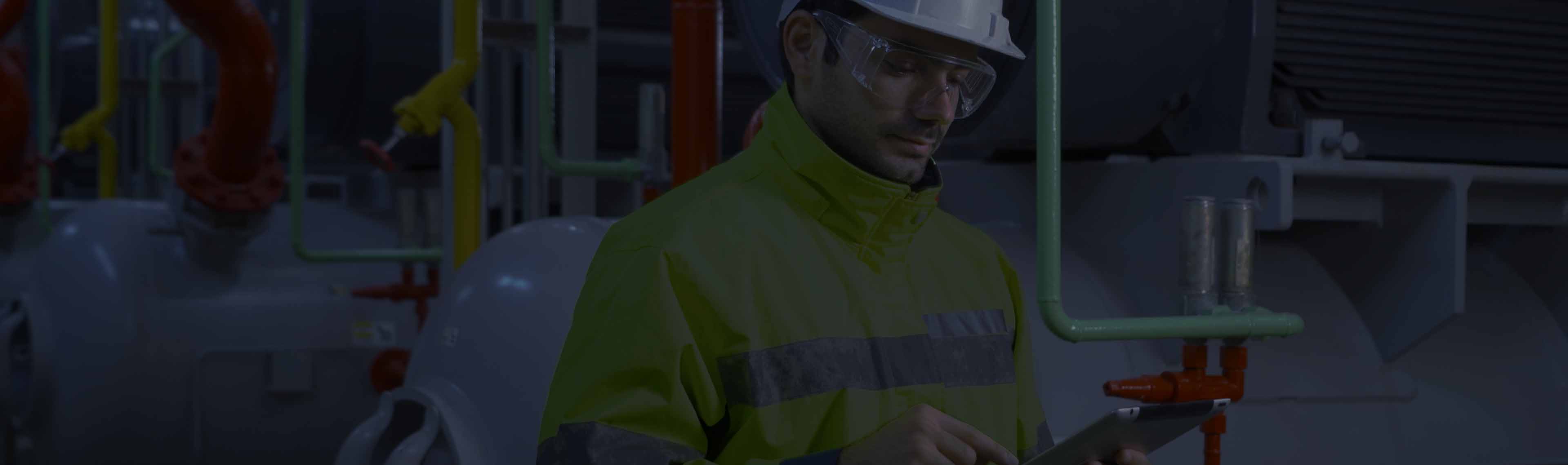 A mechanical engineer fixing a HVAC issue.